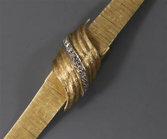 A ladys 14ct gold and diamond set cocktail bracelet watch, retailed by La Cloche, with hinged dial cover, 17.6cm.